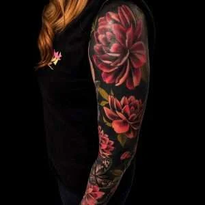 Rose sleeve in full colour, tattooed at Nu Nebula Tattoo