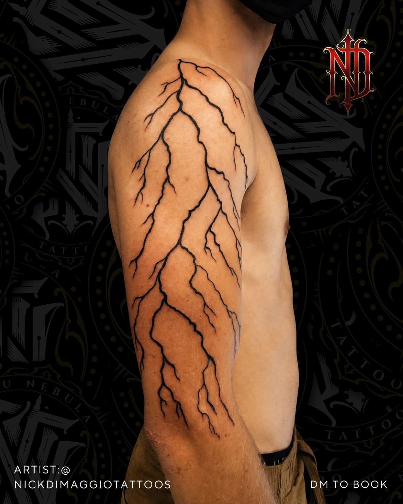 Lightning bolt arm tattoo in fine-line black and grey, tattooed by Nick DiMaggio