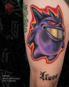 Gengar thigh tattoo in full colour, tattooed by Nick DiMaggio
